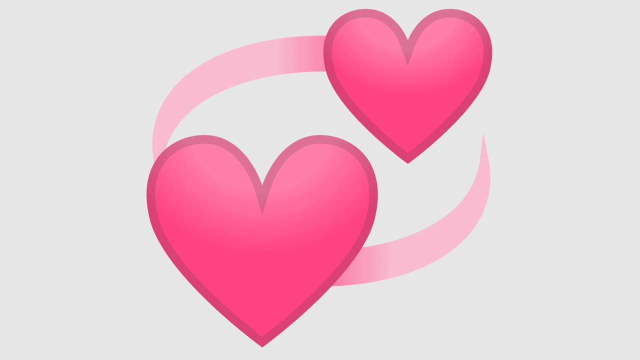 emoji de dos corazones rosados ​​giratorios